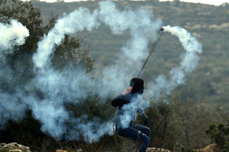 165 Palestinians injured in West Bank clashes 2 GAS CINISTER WEST BANK 165 Palestinians injured in West Bank clashes