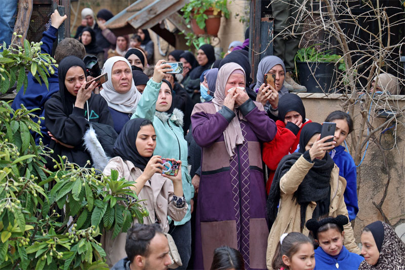Palestinian teen killed during West Bank clashes 2 PALESTINIAN MOURNERS Palestinian teen killed during West Bank clashes