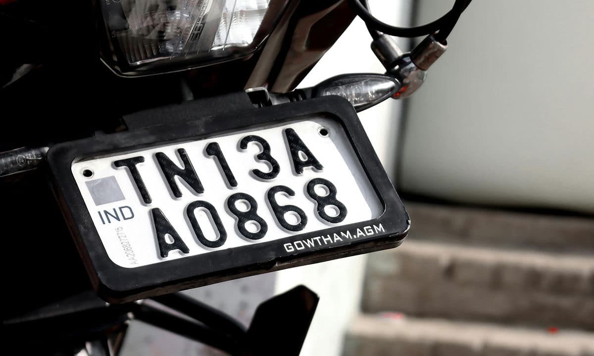 HSRP plates feature laser-etched codes, Ashok Chakra holograms, and snap-lock rivets for tamper-proof security.