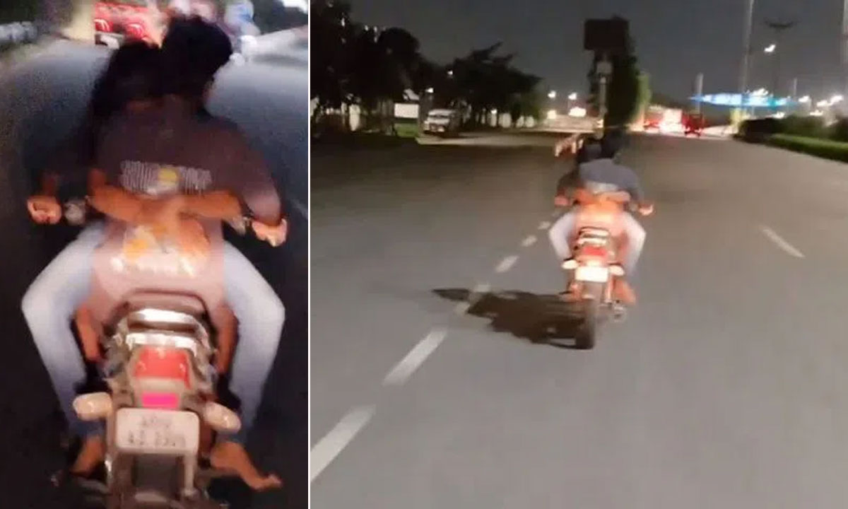 Hyderabad: Couple Caught on Camera in Risky Romantic Act on Bike 1 Hyderabad: Couple Caught on Camera in Risky Romantic Act on Bike