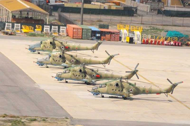 Dozens of choppers, hundreds of Humvees transferred out of Afghanistan