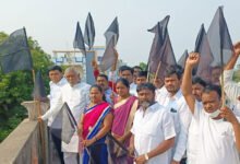 Paddy procurement : TRS leaders hoist black flags atop their houses