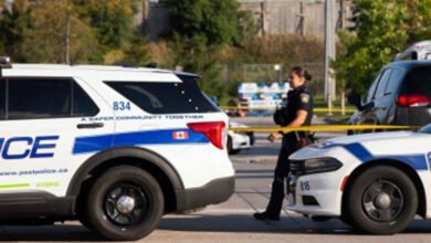 Canadian police officer shot dead, suspect in custody