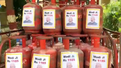 TRS hits back at FM with PM's pictures on LPG cylinders