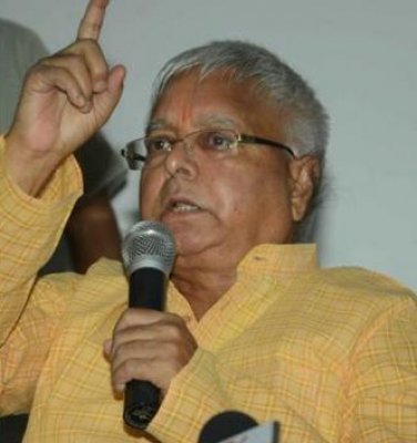Will never bow down before BJP and RSS, says Lalu Prasad