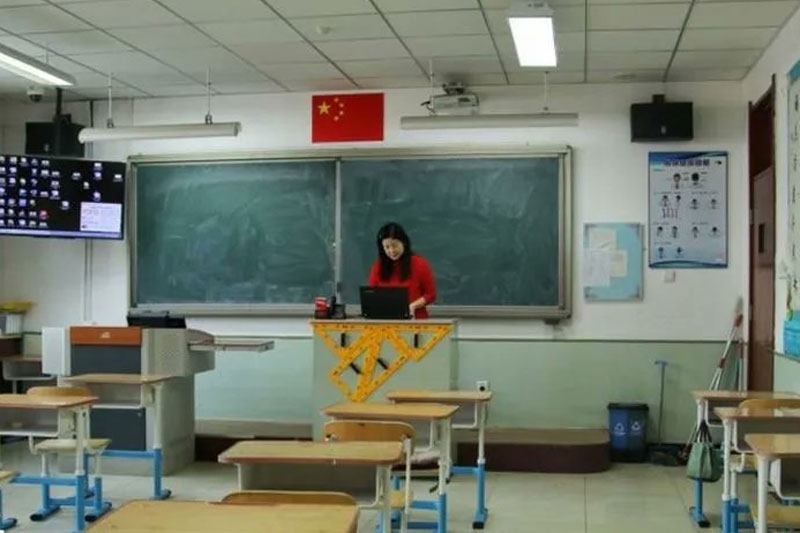 Shanghai schools to go online as Covid cases soar in China