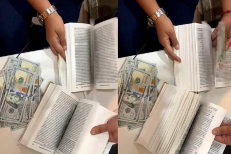 Man hiding $90,000 between book pages held at Mumbai airport