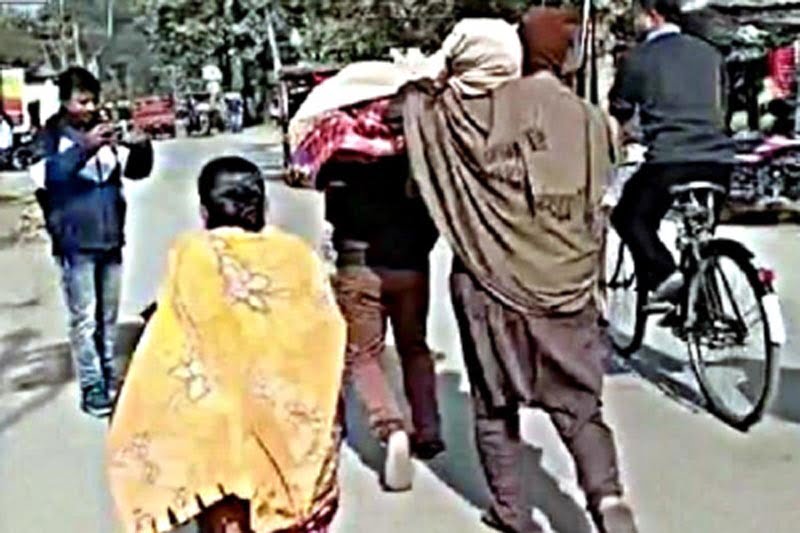Man carrying mother's body on shoulder in Bengal's Jalpaiguri shocks people