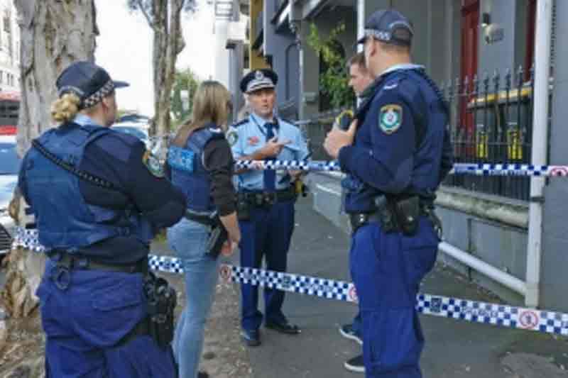 Knife-wielding man shot dead inside Sydney police station