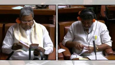 K'taka Cong leaders attend budget session with flowers behind ears