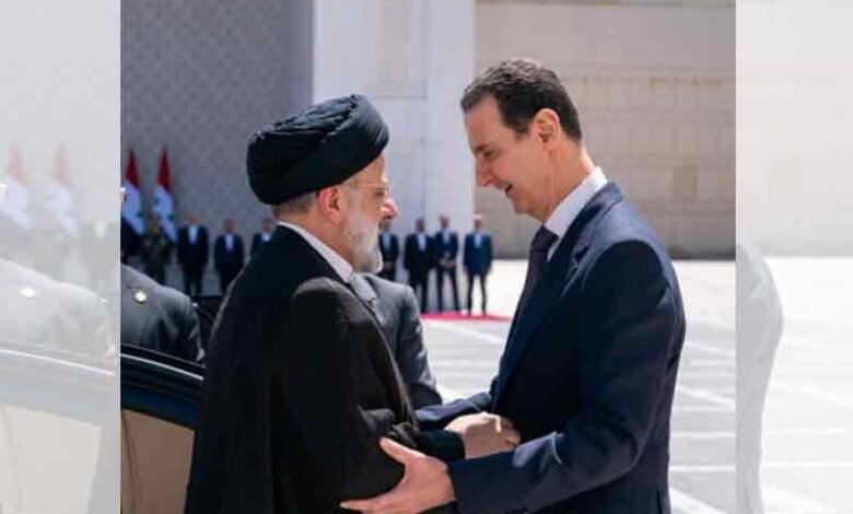 Iranian President in Syria on landmark visit