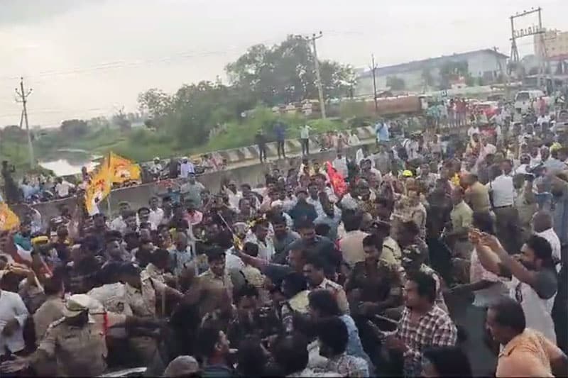 Supporters try to block police vehicle carrying Chandrababu Naidu