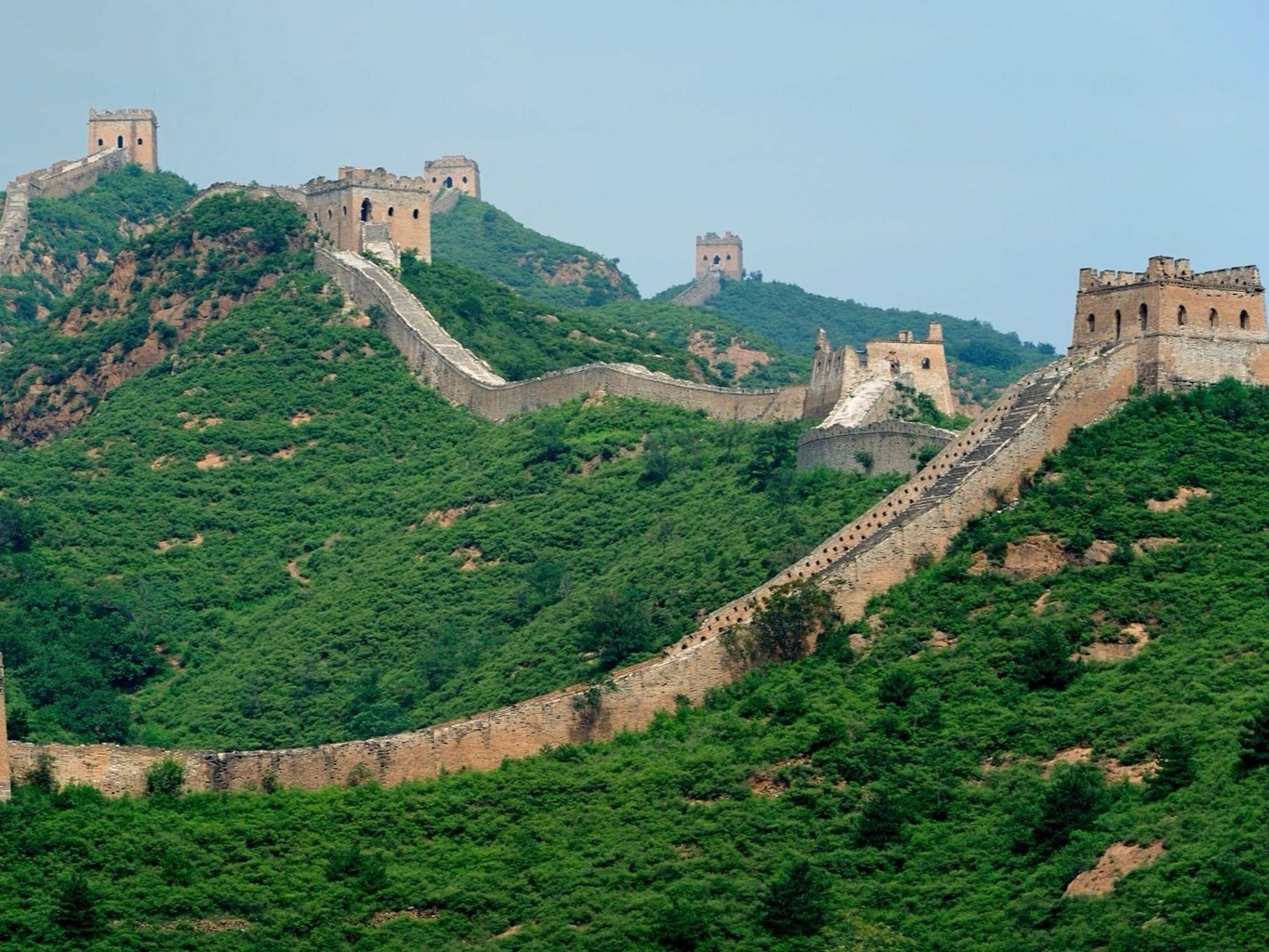 Great Wall of China damaged by workers with an excavator