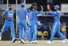 Asia Cup: Bowlers help India defend small total, end Lanka's 13-ODI win streak; seal spot in final