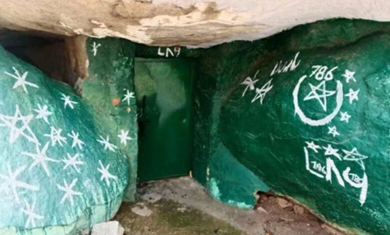 Painting boulders with Islamic symbols in K'taka, one held