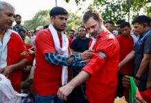 Rahul makes surprise visit to Railway station, interacts with porters