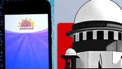 Linking Aadhaar numbers with electoral rolls is not mandatory, EC tells SC