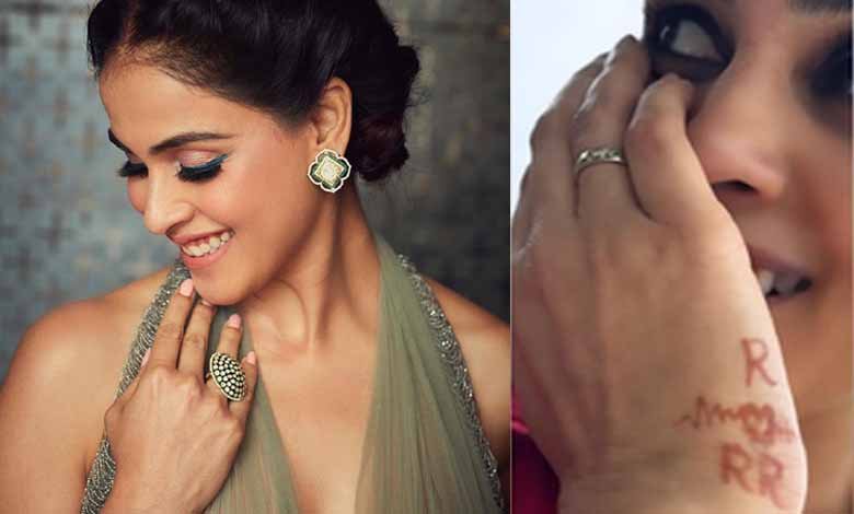 Genelia expresses her love for three ‘Rs’, wears them on her hand