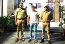 Ambulance helper held for molesting woman driver still at large