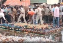 Liquor Addicts in AP Seize Opportunity Amid Police Destruction of Illicit Alcohol