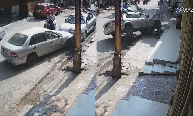 CCTV Footage: Car Loses Control, Crashes into Parked Vehicles