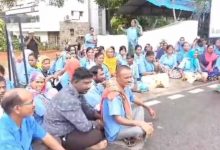 Sanitation Workers Protest in the Rain Outside GHMC Office Over Wage Cuts