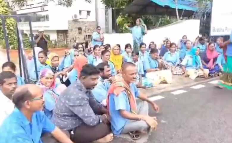 Sanitation Workers Protest in the Rain Outside GHMC Office Over Wage Cuts