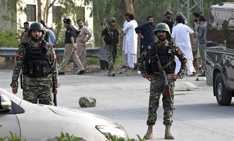 Gunmen on motorcycles kill a Pakistani policeman and a polio worker during a vaccination campaign