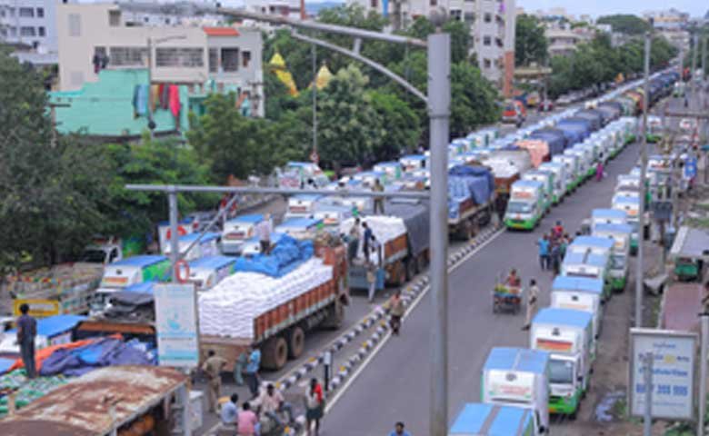 Distribution of 1,200 truckloads of relief material underway in Vijayawada