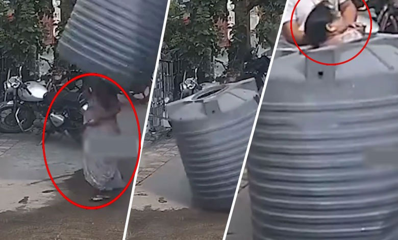 Woman Avoids Tragedy By Narrowly Escaping Falling Water Tank