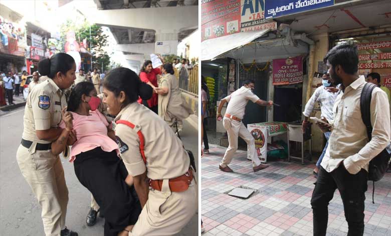 Police cane protesting Group 1 services aspirants in Hyderabad