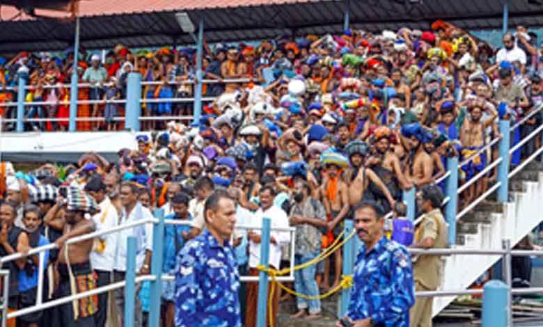 Pilgrims throng Sabarimala temple on opening day of long festive season