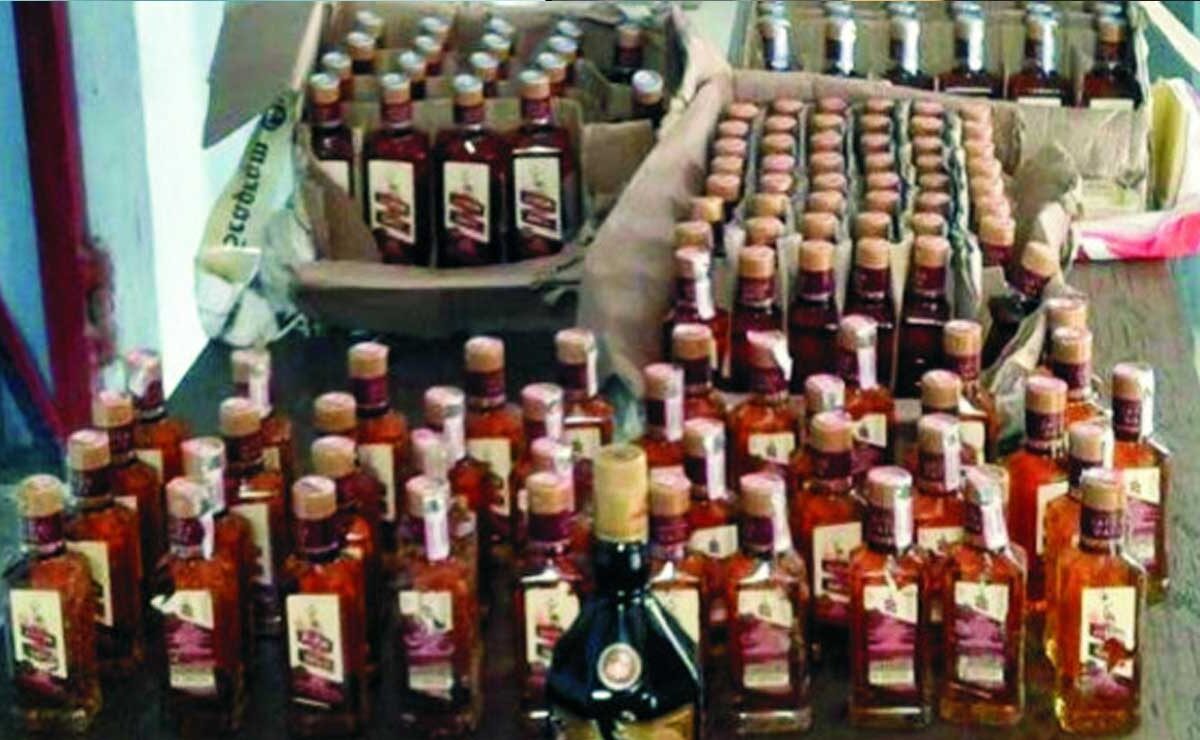 Hyderabad: Smuggled Liquor Seizure - 233 Bottles and Two Arrests by Excise Team