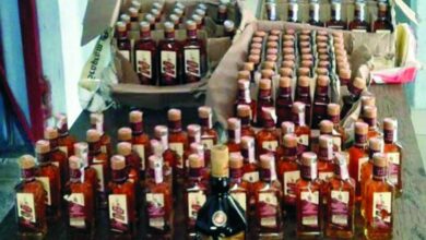 Hyderabad: Smuggled Liquor Seizure - 233 Bottles and Two Arrests by Excise Team