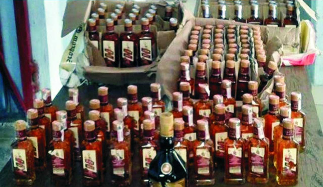 Hyderabad: Smuggled Liquor Seizure - 233 Bottles and Two Arrests by Excise Team