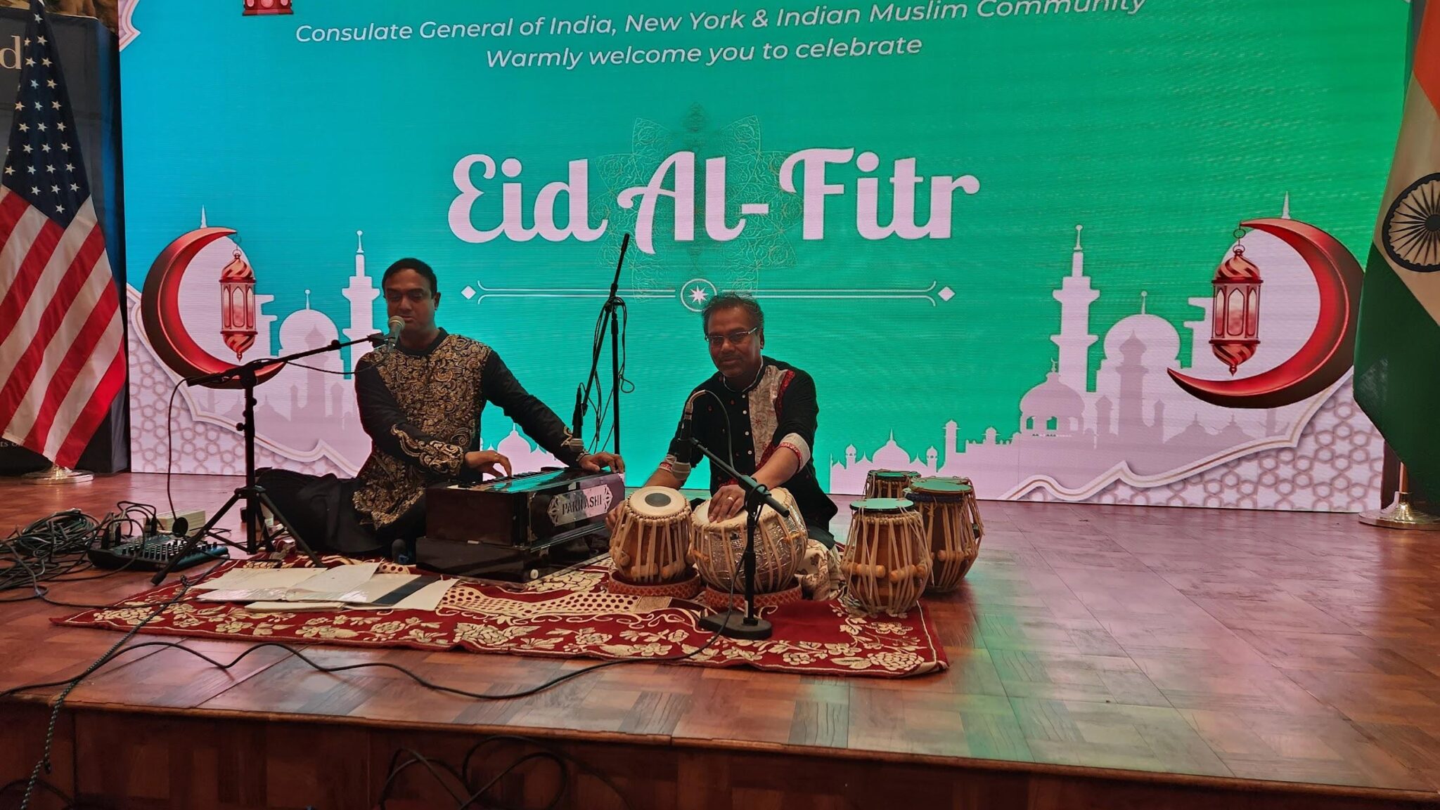 Suman Laskar (vocals) and Arindam Chakraborty (tabla) provide a soulful ghazal performance concluding the **Eid Celebration at the Indian Consulate**. Photo: CGI
