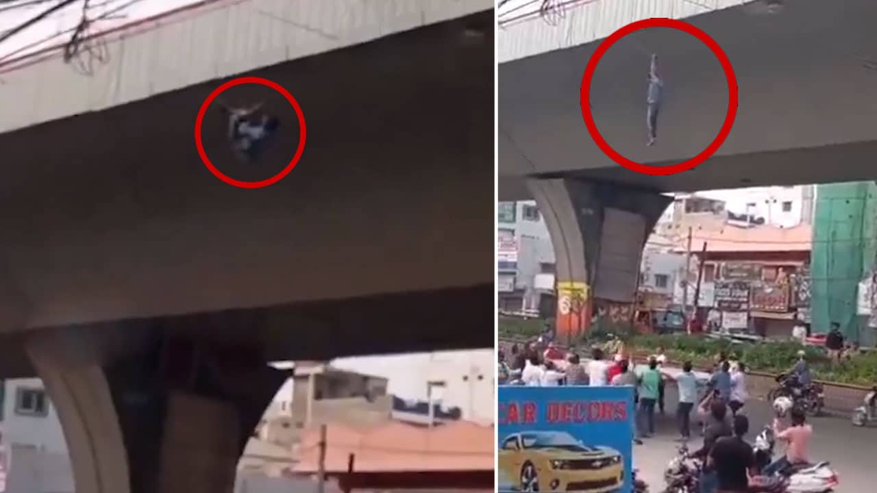 Hyderabad Shocker: Man Falls Off Bridge at Attapur, Hangs from Cable, Rescued by Locals: Video