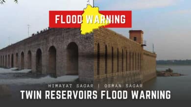 Water is released from the gates of Osman Sagar reservoir on September 12, 2025, following heavy rainfall in the catchment area.
