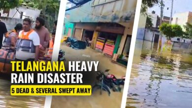 Vehicles submerged and swept away on a waterlogged street in Hyderabad following the record-breaking rainfall on September 22, 2025.