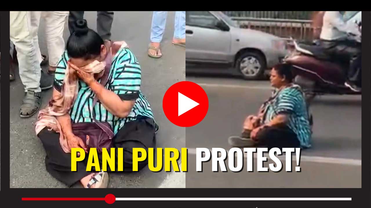 Vadodara police intervene as a woman stages a dramatic road protest over a pani puri dispute near Sursagar Lake.