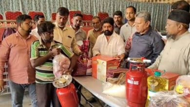 AIMIM Distributes Relief Kits to Rain-Affected Families in Karwan