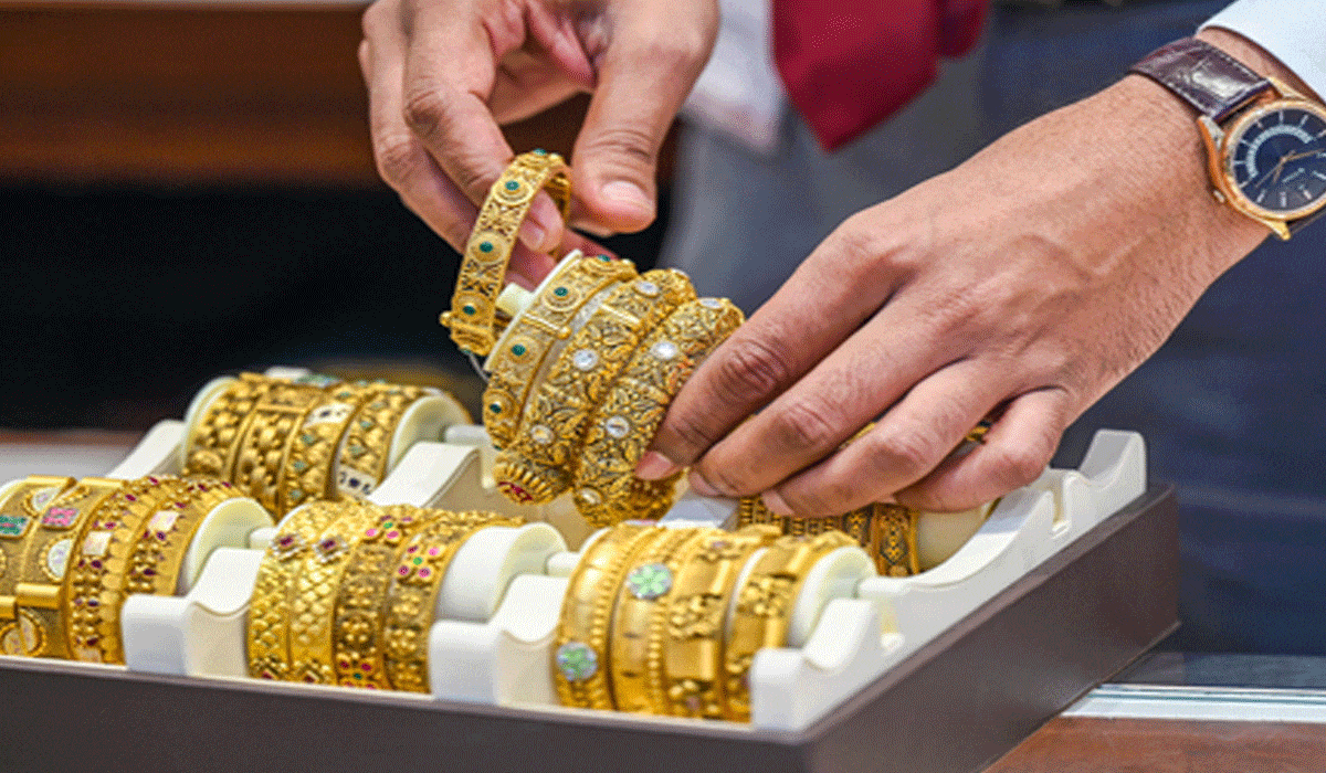 Gold prices dip as safe-haven demand declines