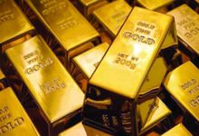 Gold prices dip as strong dollar, weak global sentiment weigh on bullion