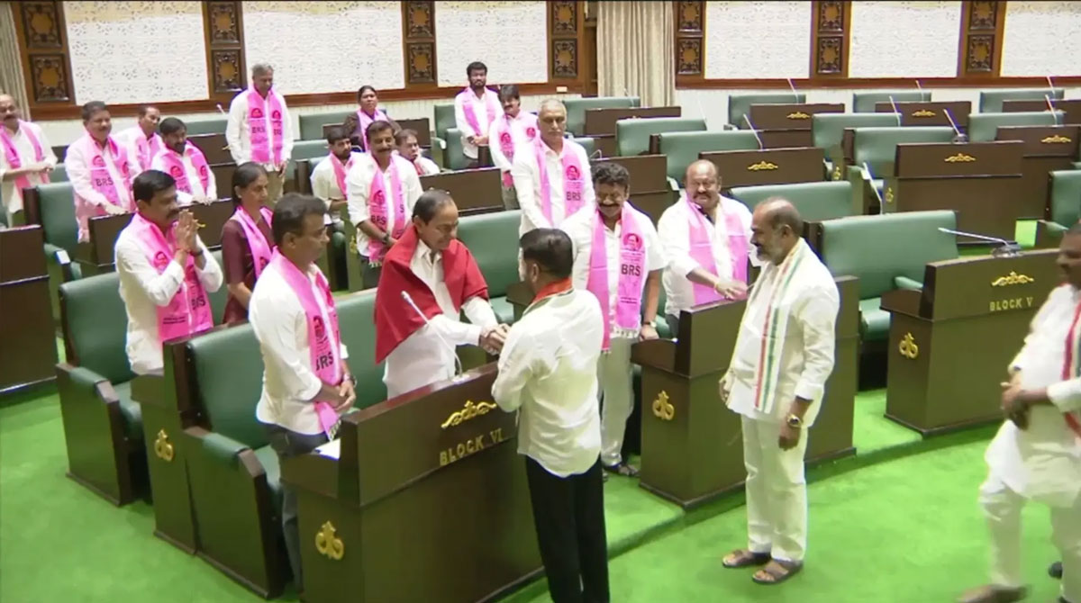 Amid bitter war of words, Revanth Reddy shakes hands with KCR