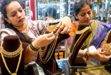 Gold rises to record high over strong safe haven demand