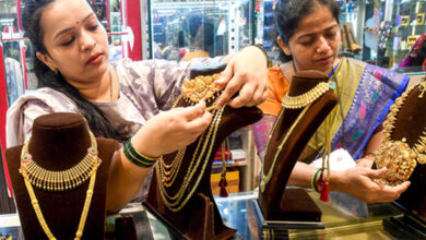 Gold rises to record high over strong safe haven demand