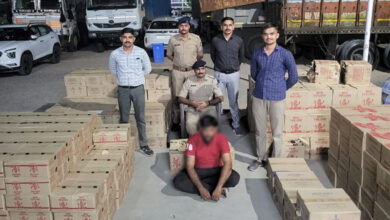 Gujarat Police bust liquor smuggling racket, seize bottles 10,000 hidden under helmets in truck