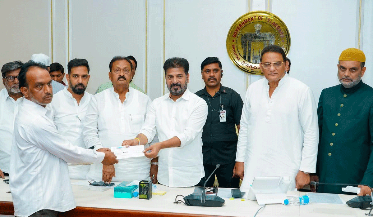 CM Revanth Reddy Hands Over ₹2.23 Crore Compensation to Madina Bus Tragedy Victims; Minister Mohammad Azharuddin Led Relief Efforts