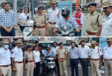 Traffic Awareness Seminar and Free Helmet Distribution Held at Nanal Nagar by Hyderabad Traffic Police