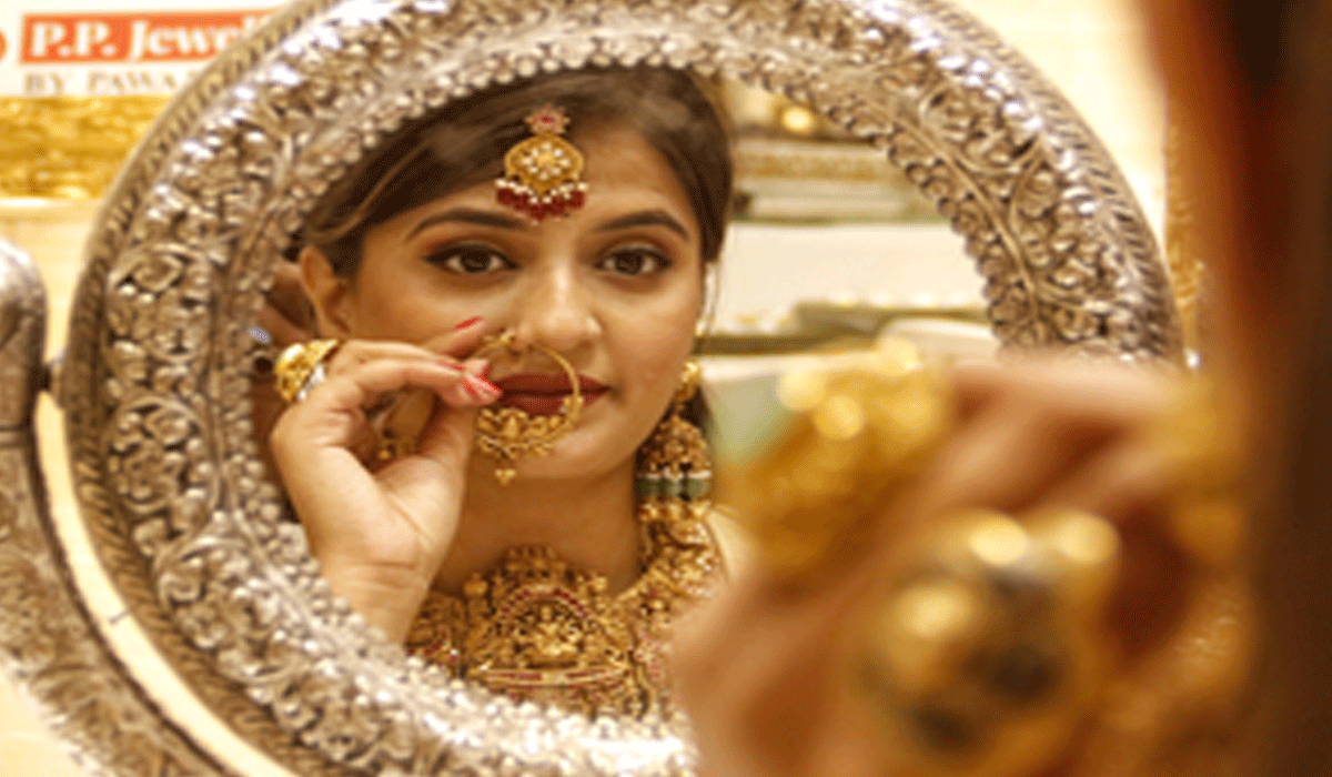 Gold, silver trade choppy as crude rallies over West Asia tensions